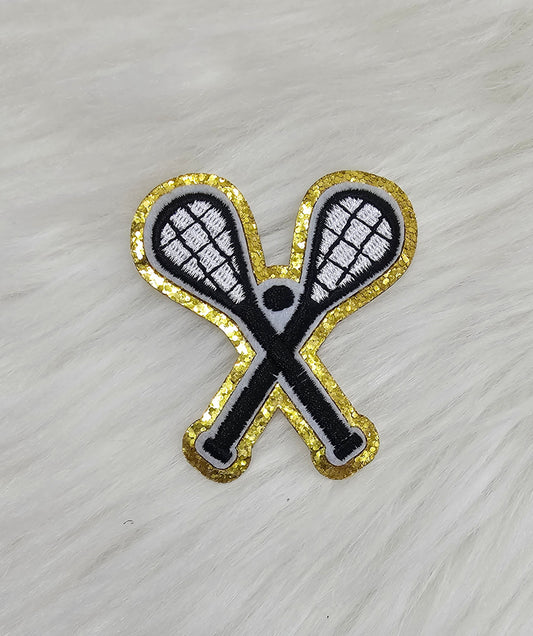 Crossed Lacross Sticks with Ball on Gold Glitter Iron On Patch